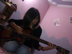 Posing with the guitar. :)